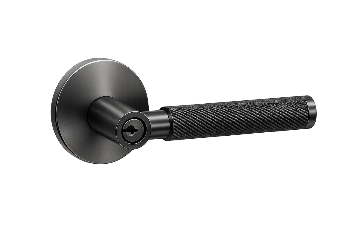 Black door handle with textured grip on a white background