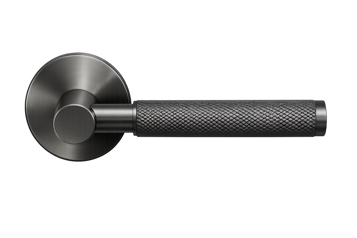 Black door handle with textured grip on a white background