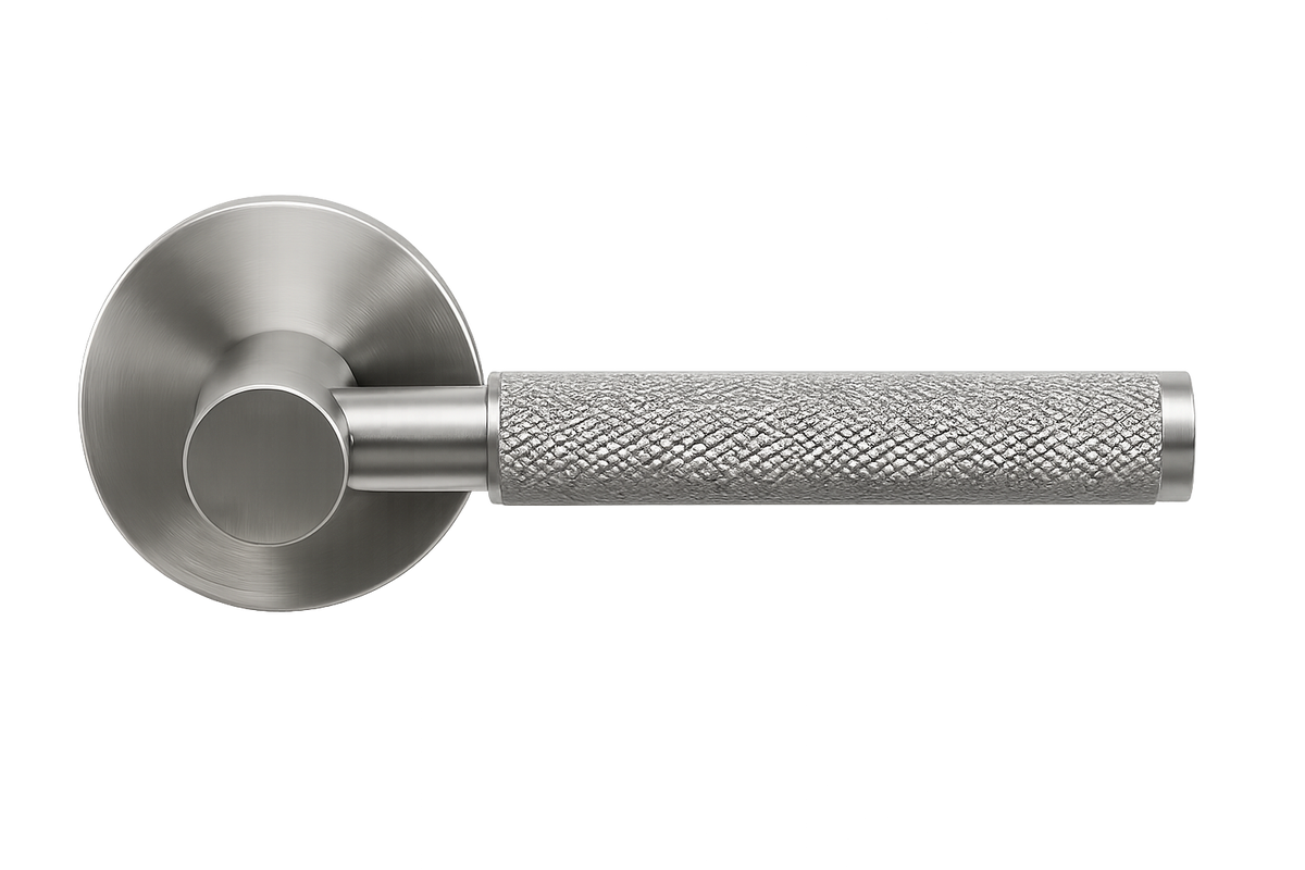Silver door handle with textured grip on a white background