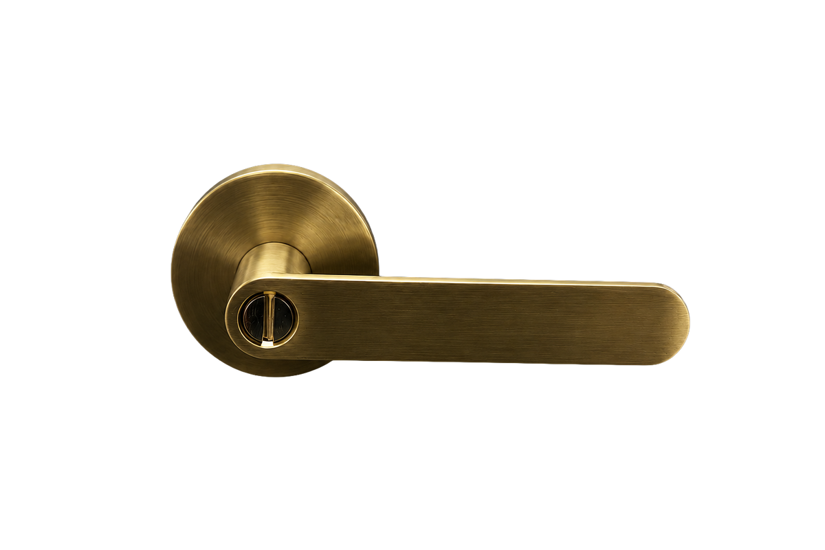 Gold door handle on a white background